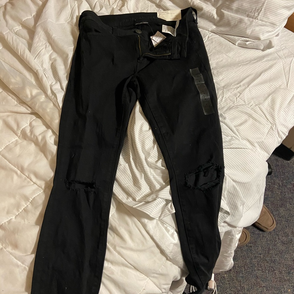 black american eagle skinny jeans